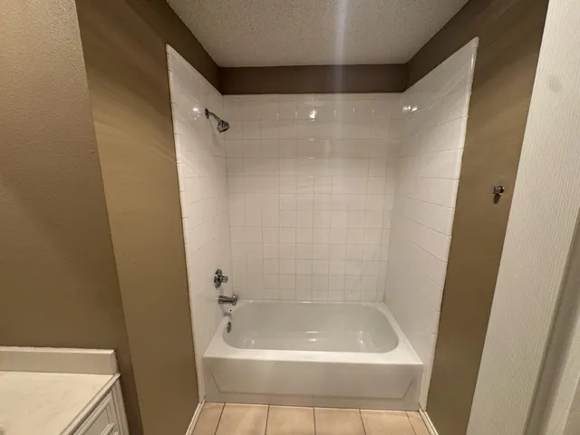 a bathroom with a bathtub