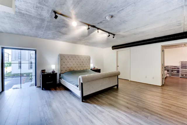 a view of a hallway with seating area