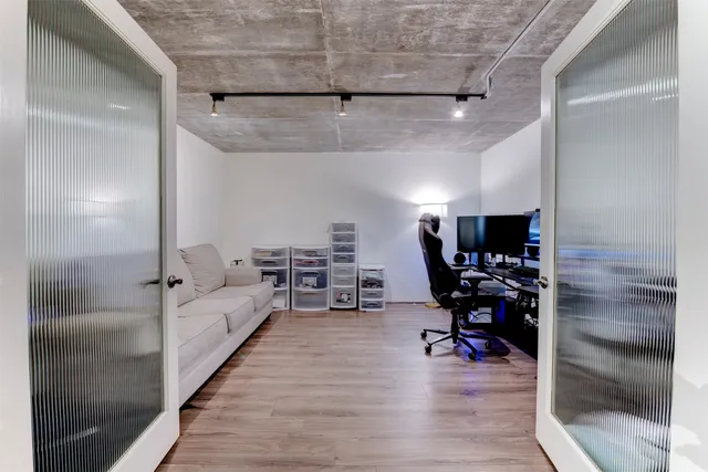 a bathroom with a sink a mirror and a shower