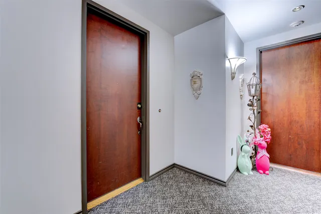 a view of an apartment with a backyard