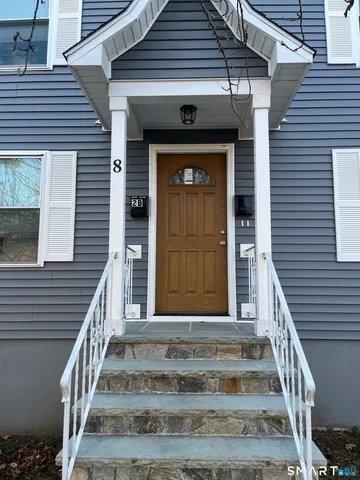 a front view of a house with a window