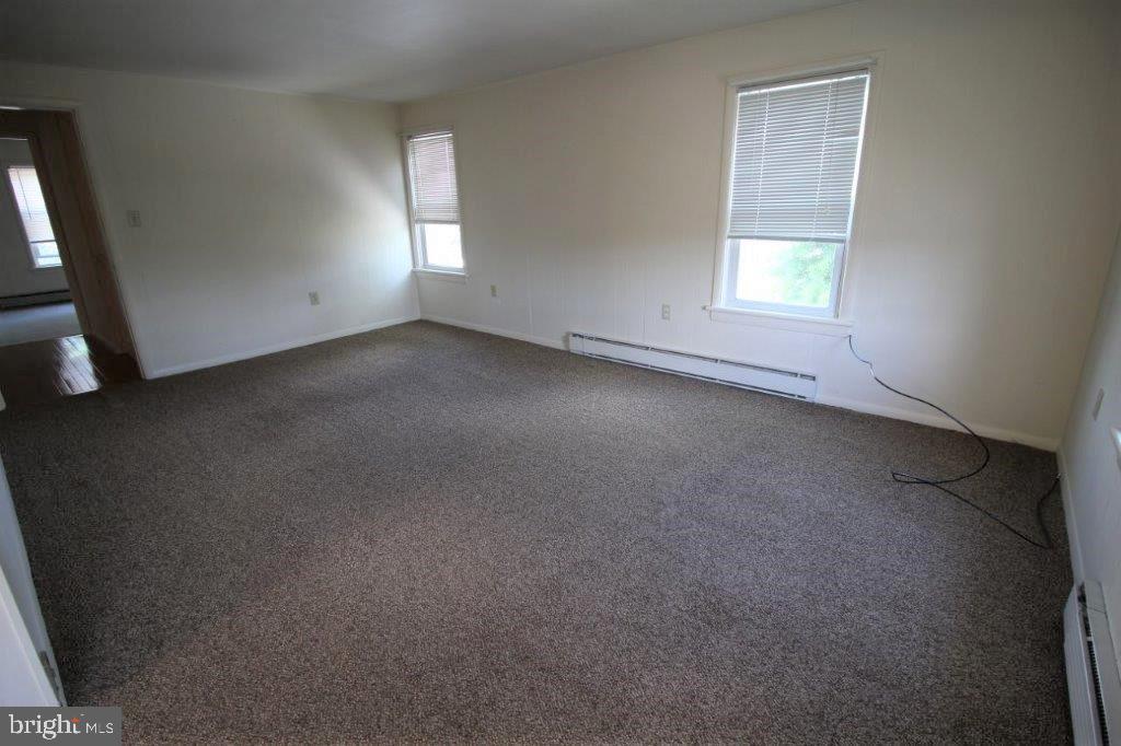 42 B Hatville Road Gordonville, PA 17529 - Photo 3 of 6 an empty room with a window
