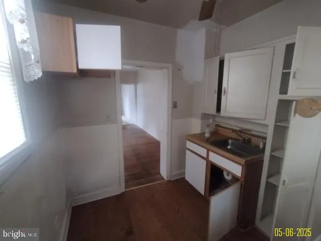 a kitchen with a stove and a microwave