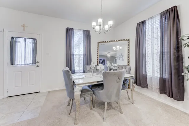 a spacious bedroom with a bed and a window