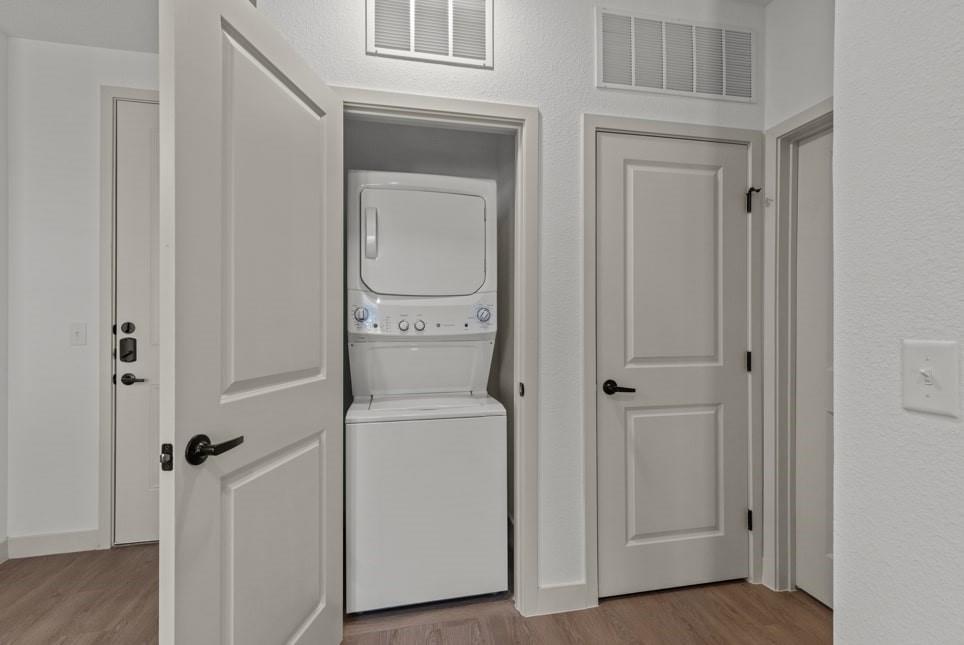 3120 East Park Row Drive, Unit 4312 Arlington, TX 76010 - Photo 11 of 11 a view of a storage room with washer and dryer