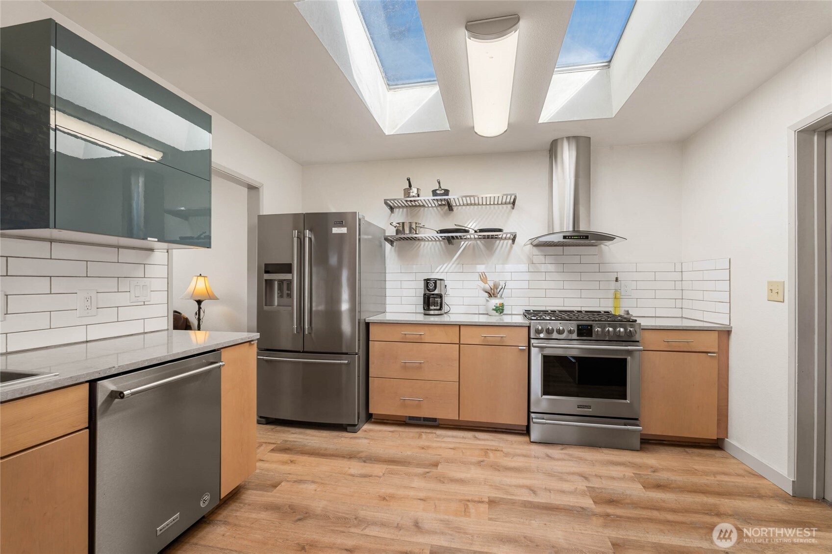 71 Blue Grade Road East Wenatchee, WA 98802 - Photo 11 of 29 a kitchen with stainless steel appliances granite countertop a sink a stove a refrigerator and cabinets