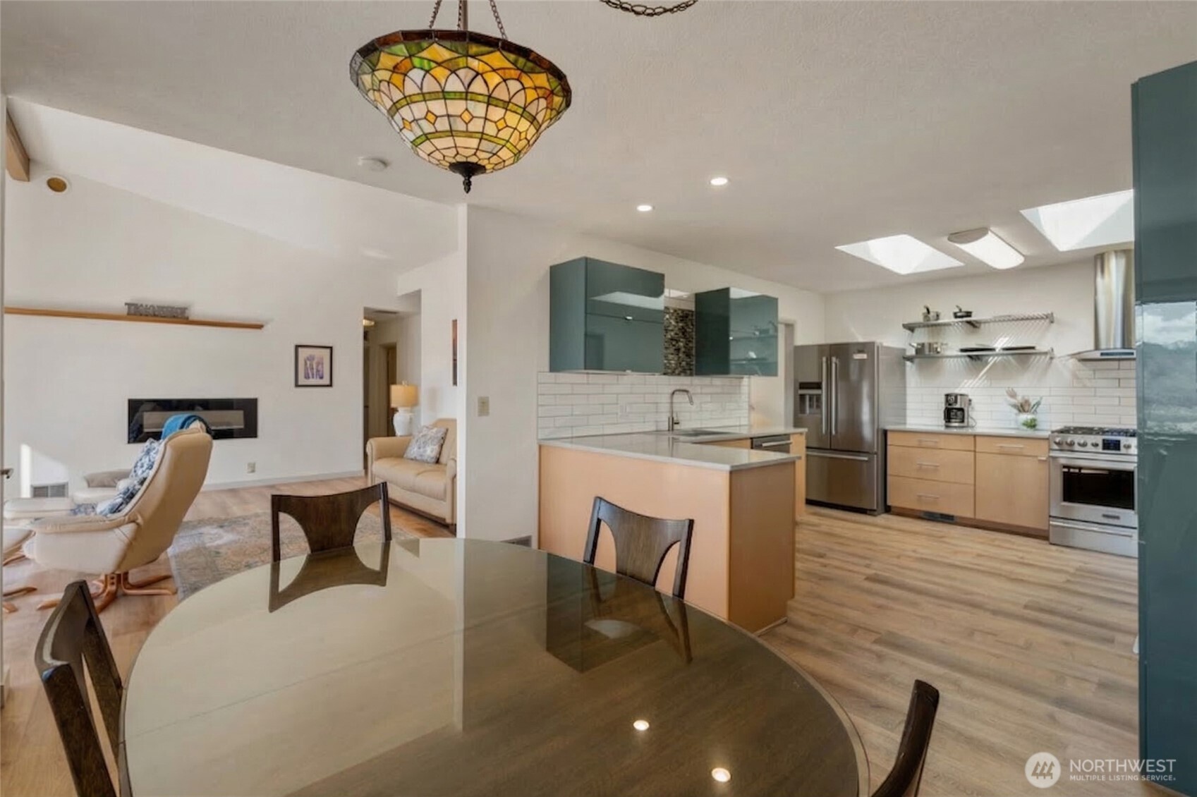 71 Blue Grade Road East Wenatchee, WA 98802 - Photo 13 of 29 a living room with furniture and a dining table with kitchen view