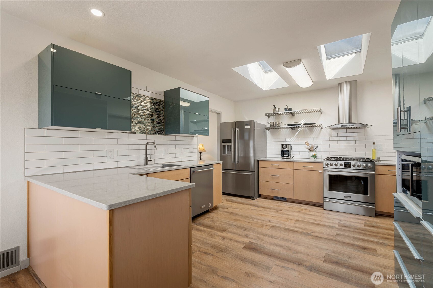 71 Blue Grade Road East Wenatchee, WA 98802 - Photo 5 of 29 a kitchen with stainless steel appliances granite countertop a sink stove and refrigerator