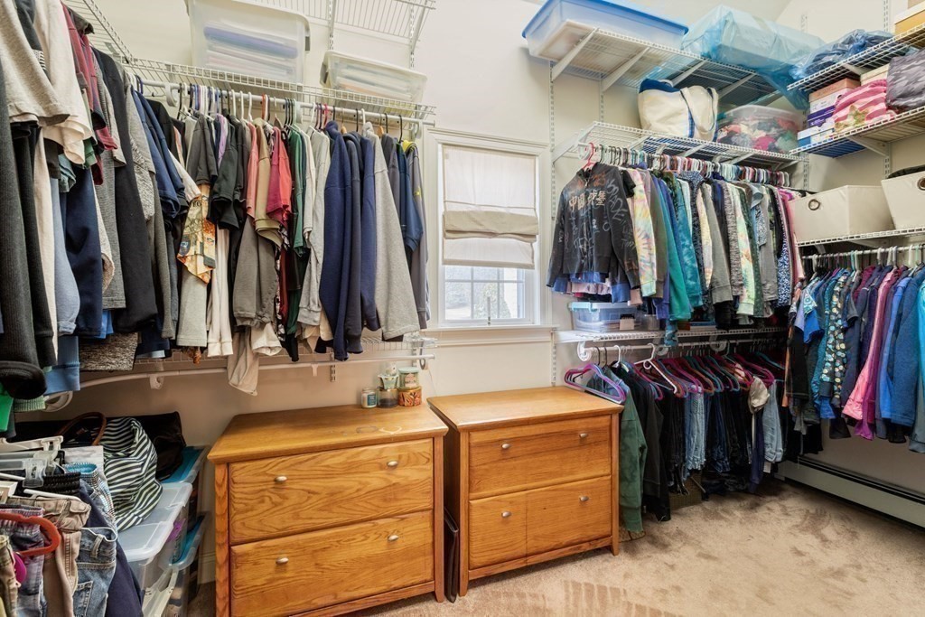 5 Rolling Meadow Drive Millis, MA 02054 - Photo 25 of 42 a view of walk in closet with clothes and shoes