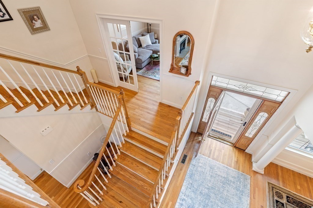 5 Rolling Meadow Drive Millis, MA 02054 - Photo 26 of 42 a view of entryway and hall with wooden floor