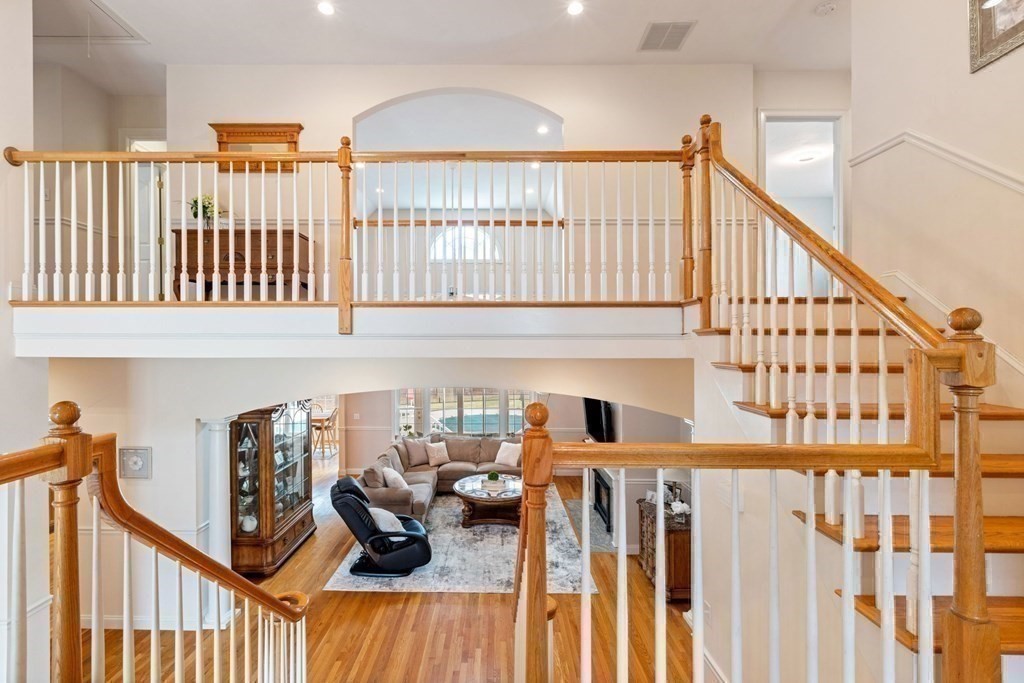 5 Rolling Meadow Drive Millis, MA 02054 - Photo 29 of 42 a view of a porch with furniture and stairs