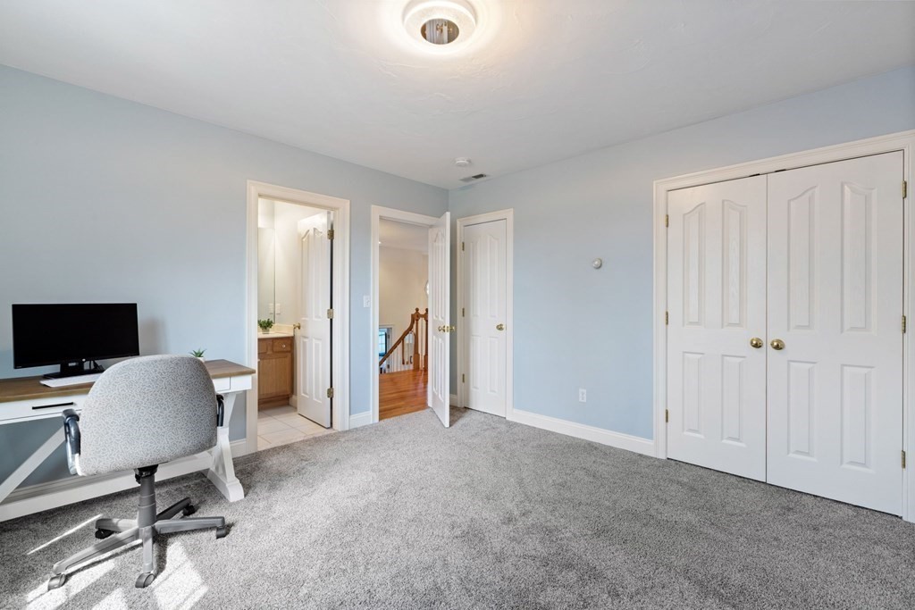 5 Rolling Meadow Drive Millis, MA 02054 - Photo 30 of 42 a view of a workspace with furniture and a bedroom