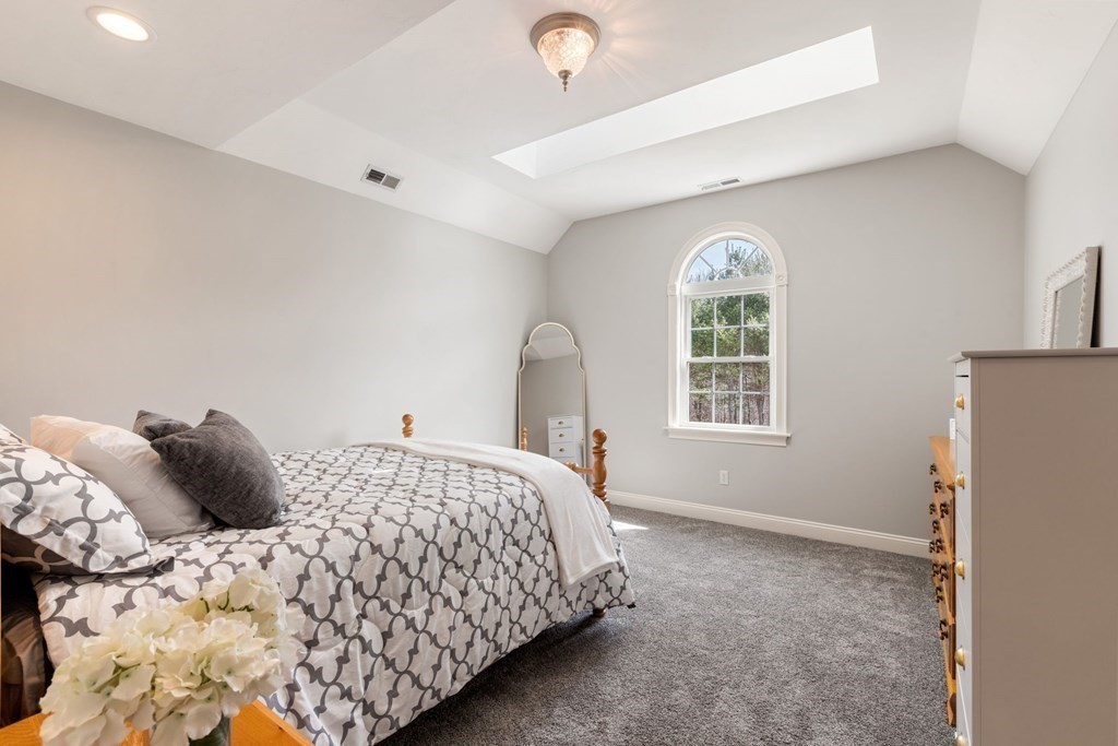5 Rolling Meadow Drive Millis, MA 02054 - Photo 32 of 42 a bedroom with a bed and a window