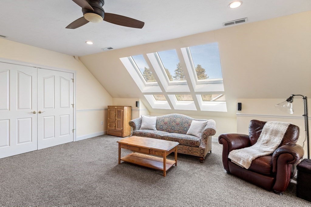 5 Rolling Meadow Drive Millis, MA 02054 - Photo 36 of 42 a living room with furniture and a large window