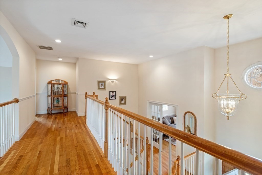 5 Rolling Meadow Drive Millis, MA 02054 - Photo 37 of 42 a view of a hallway with a window