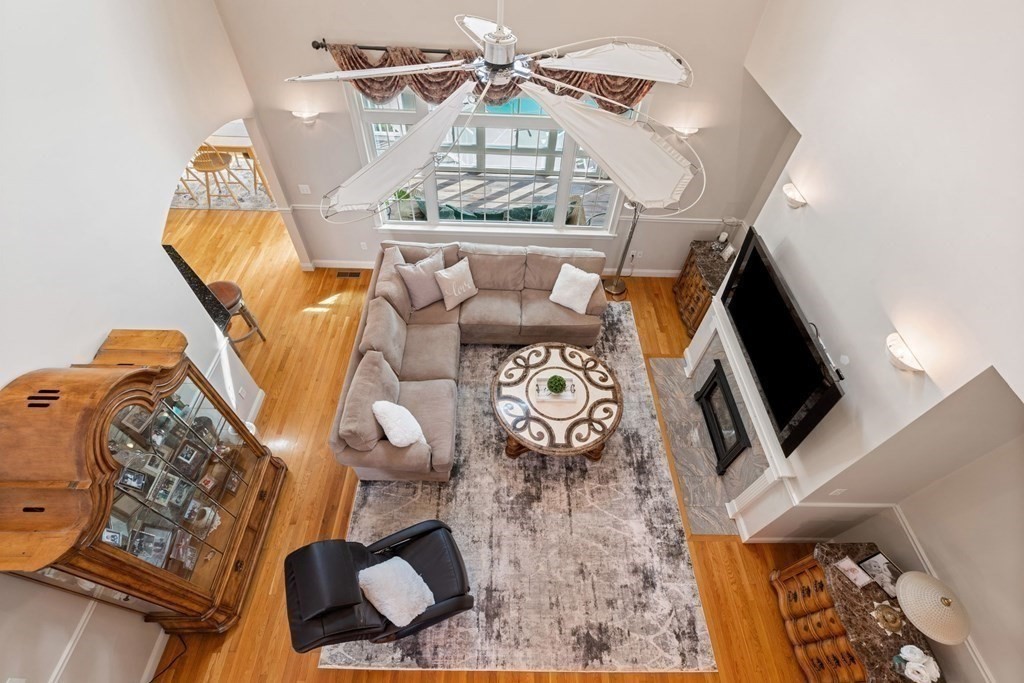 5 Rolling Meadow Drive Millis, MA 02054 - Photo 39 of 42 a view of living room with furniture and a fireplace