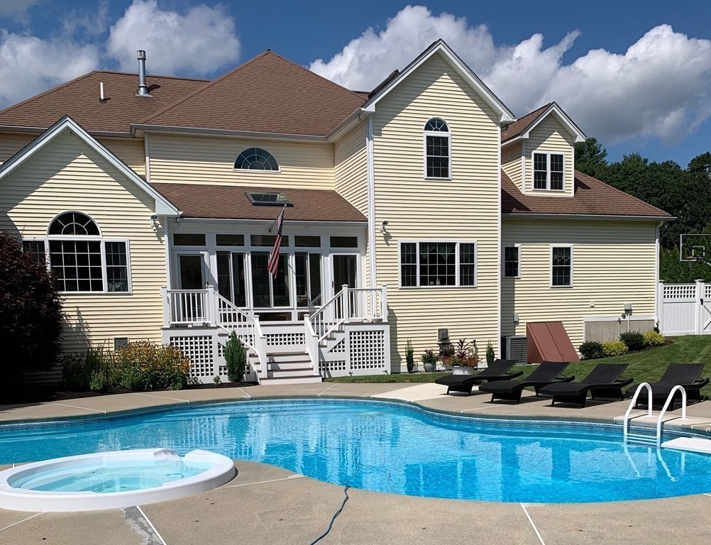 5 Rolling Meadow Drive Millis, MA 02054 - Photo 40 of 42 a house view with a outdoor seating
