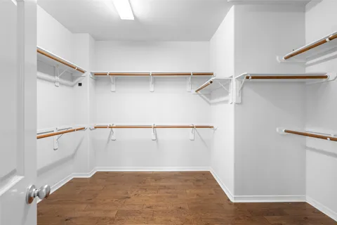 a view of a kitchen with stove top oven