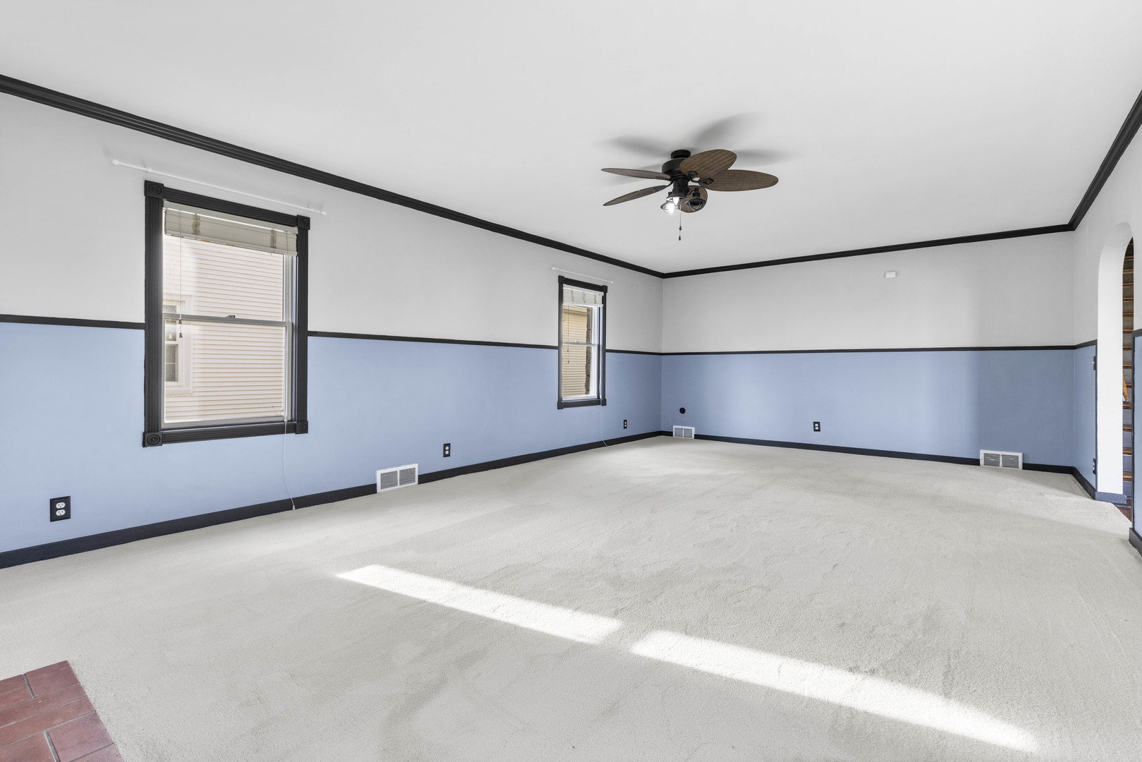 1082 North 8th Street Rochelle, IL 61068 - Photo 3 of 22 an empty room with windows