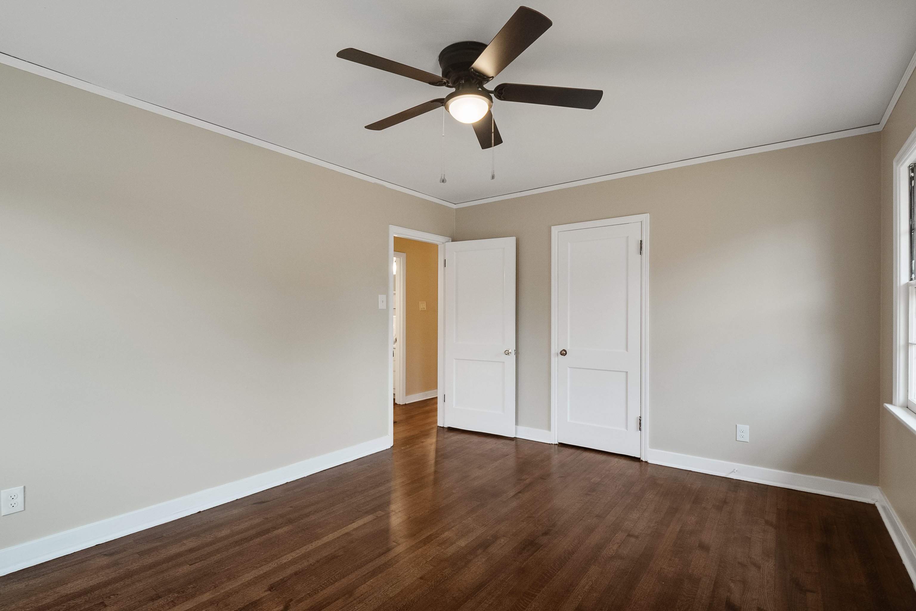 4329 Jamerson Road Memphis, TN 38122 - Photo 20 of 33 a view of an empty room with wooden floor