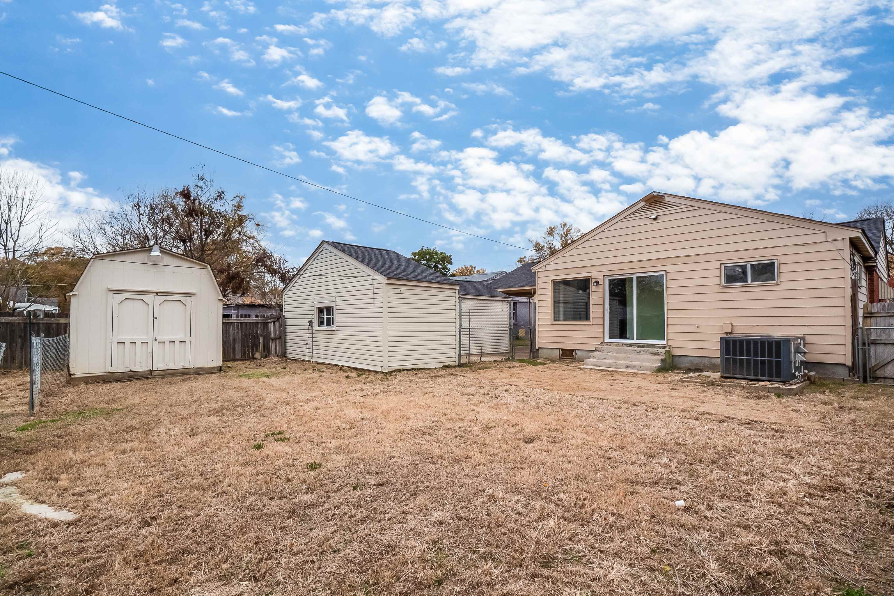 4329 Jamerson Road Memphis, TN 38122 - Photo 24 of 33 a view of a house with a yard