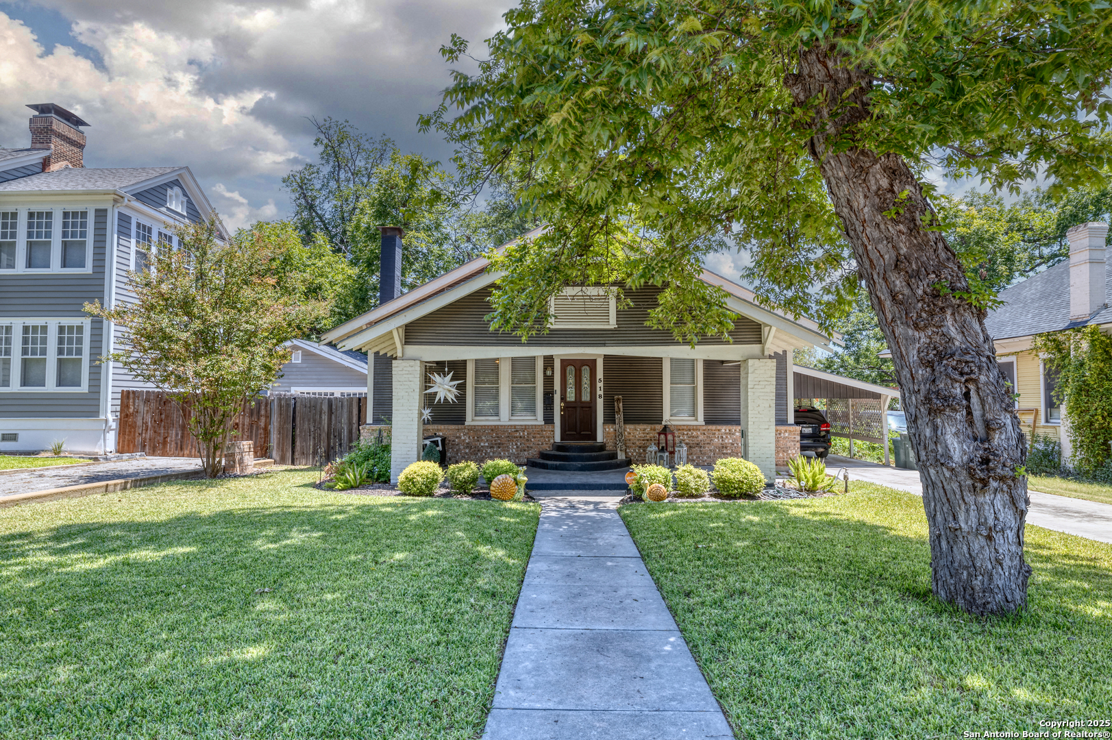 518 North Getty Street Uvalde, TX 78801 - Photo 1 of 31 a front view of house with yard and green space