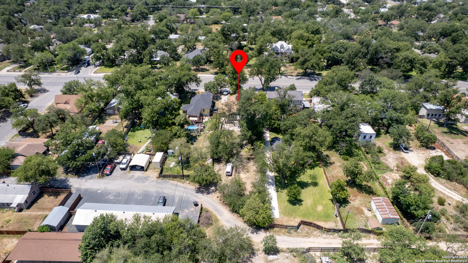 518 North Getty Street Uvalde, TX 78801 - Photo 29 of 31 an aerial view of residential houses with outdoor space and trees