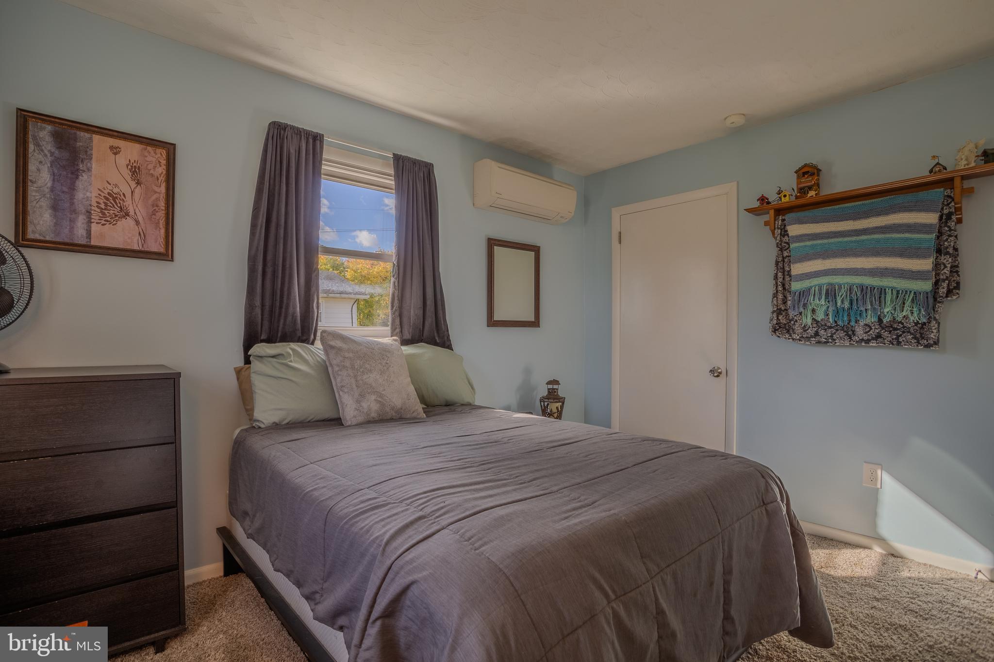 106 McDonald Street Ranson, WV 25438 - Photo 16 of 27 a bedroom with a bed and a closet