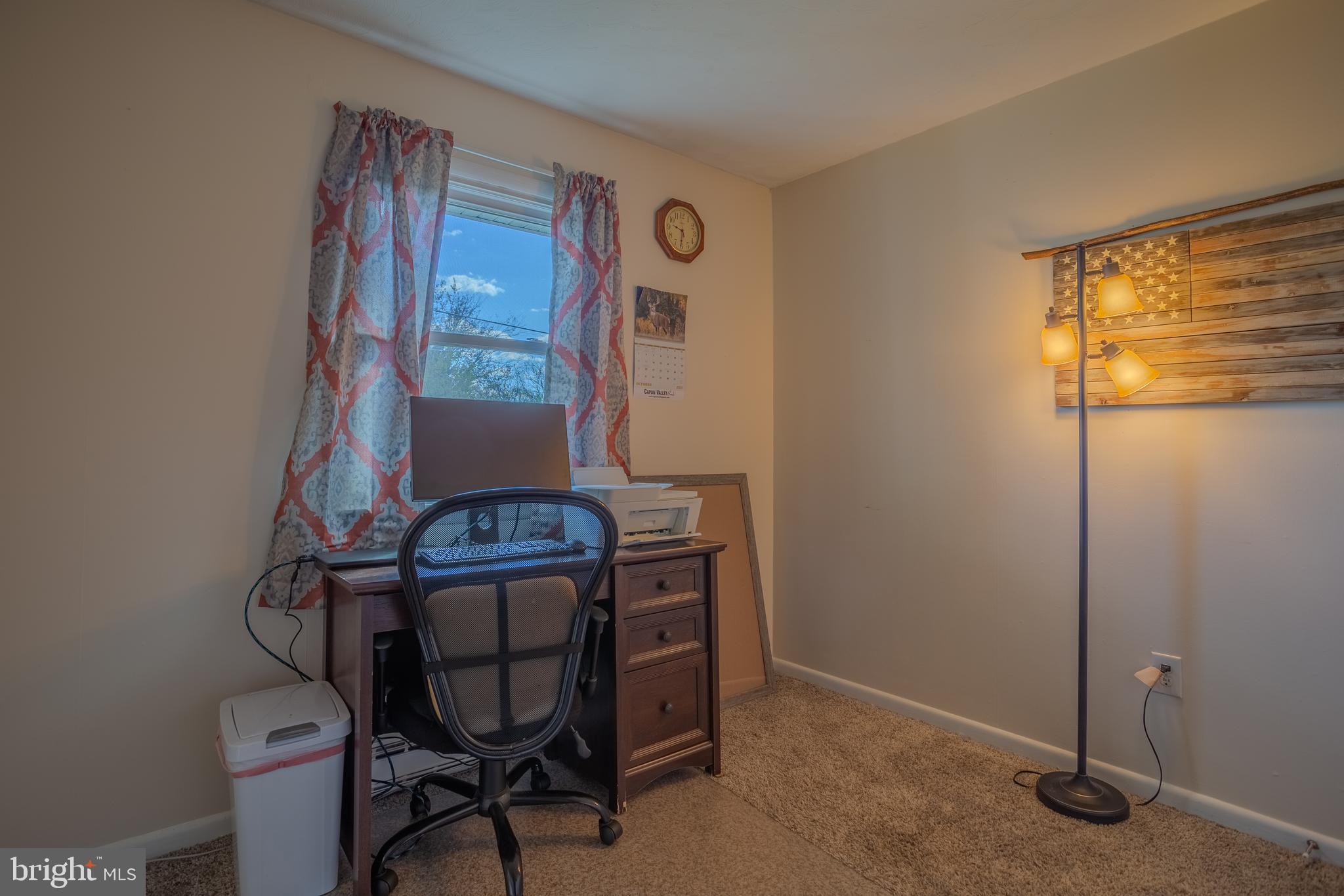 106 McDonald Street Ranson, WV 25438 - Photo 21 of 27 a view of a room with gym equipment