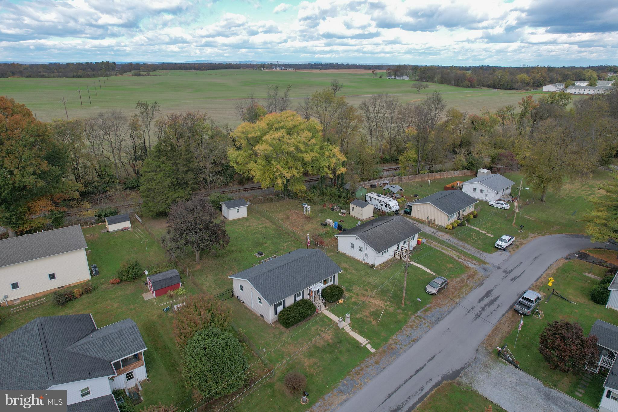 106 McDonald Street Ranson, WV 25438 - Photo 27 of 27 an aerial view of a house with garden space and lake view