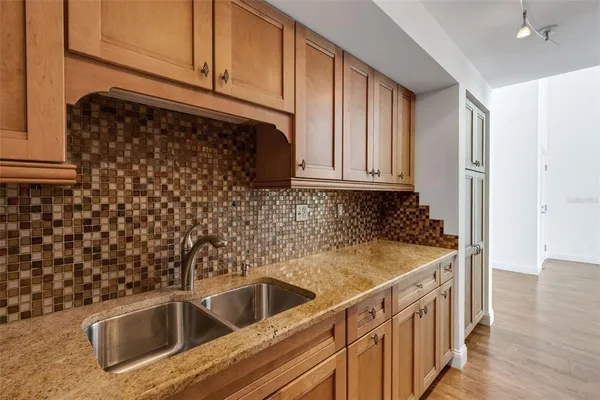 a kitchen with a stove and a microwave