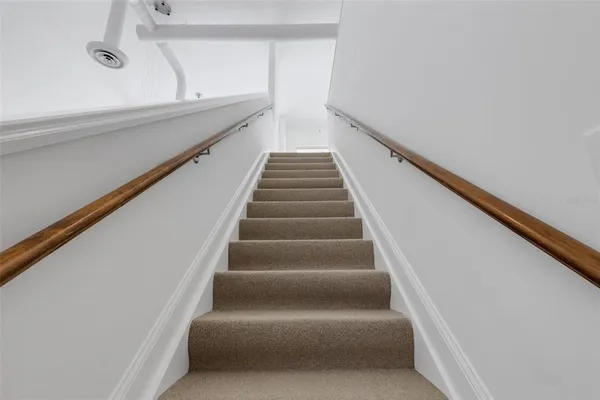 a view of hallway with stairs