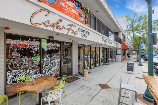 a view of a chairs and tables in patio