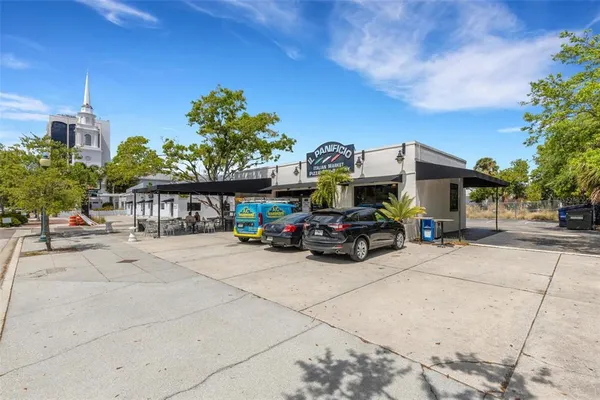 a view of a street with cars