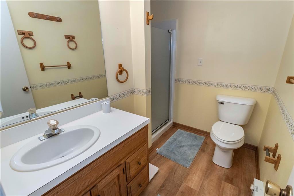 13 Lakeview Road Hidden Valley, PA 15502 - Photo 14 of 33 a bathroom with a sink toilet and shower