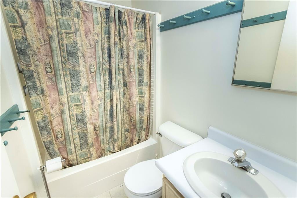 13 Lakeview Road Hidden Valley, PA 15502 - Photo 20 of 33 a bathroom with a sink toilet and shower