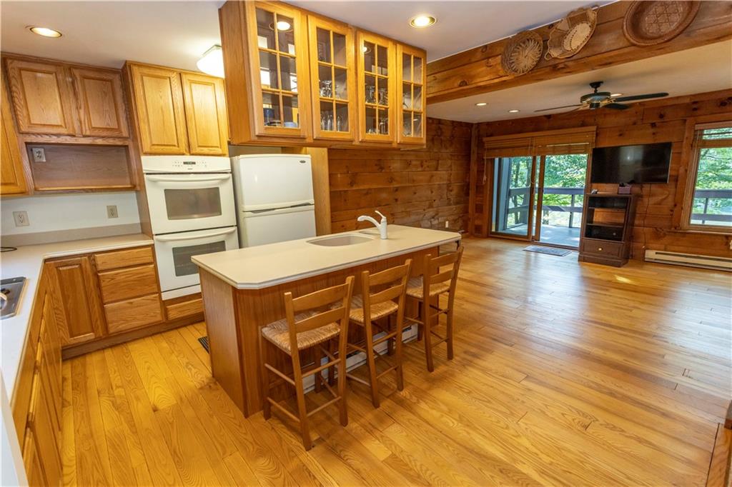 13 Lakeview Road Hidden Valley, PA 15502 - Photo 2 of 33 a kitchen with stainless steel appliances granite countertop a sink and a refrigerator