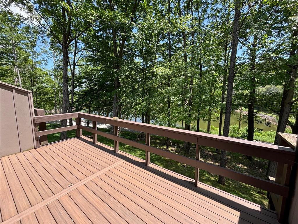 13 Lakeview Road Hidden Valley, PA 15502 - Photo 6 of 33 a view of balcony with wooden floor and fence