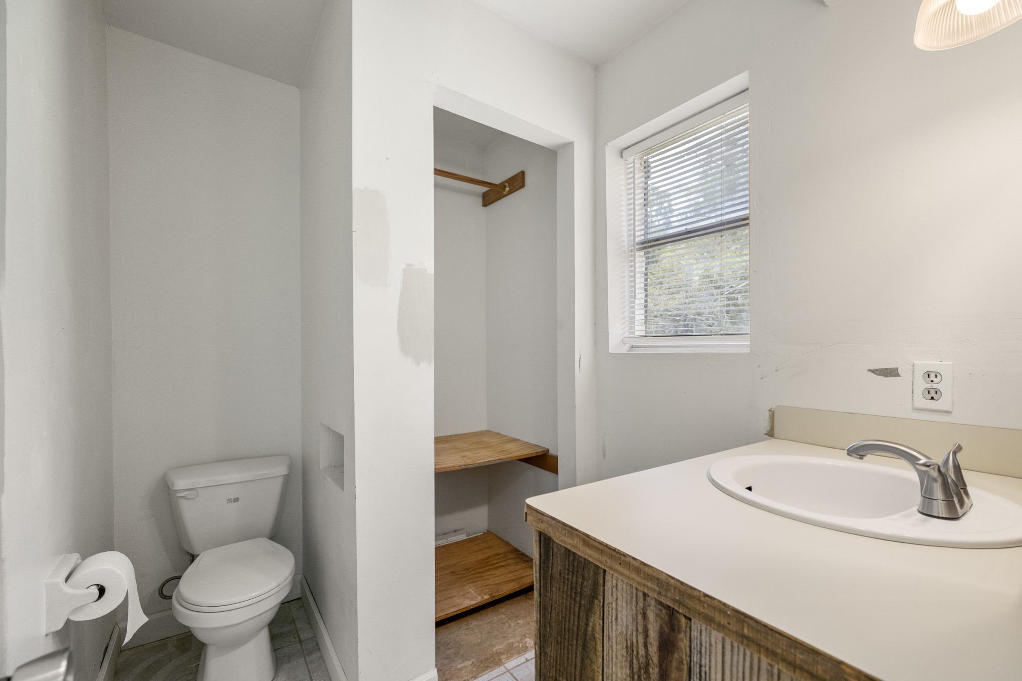 140 Friar Tuck Road Shepherd, TX 77371 - Photo 15 of 36 a bathroom with a sink toilet and vanity