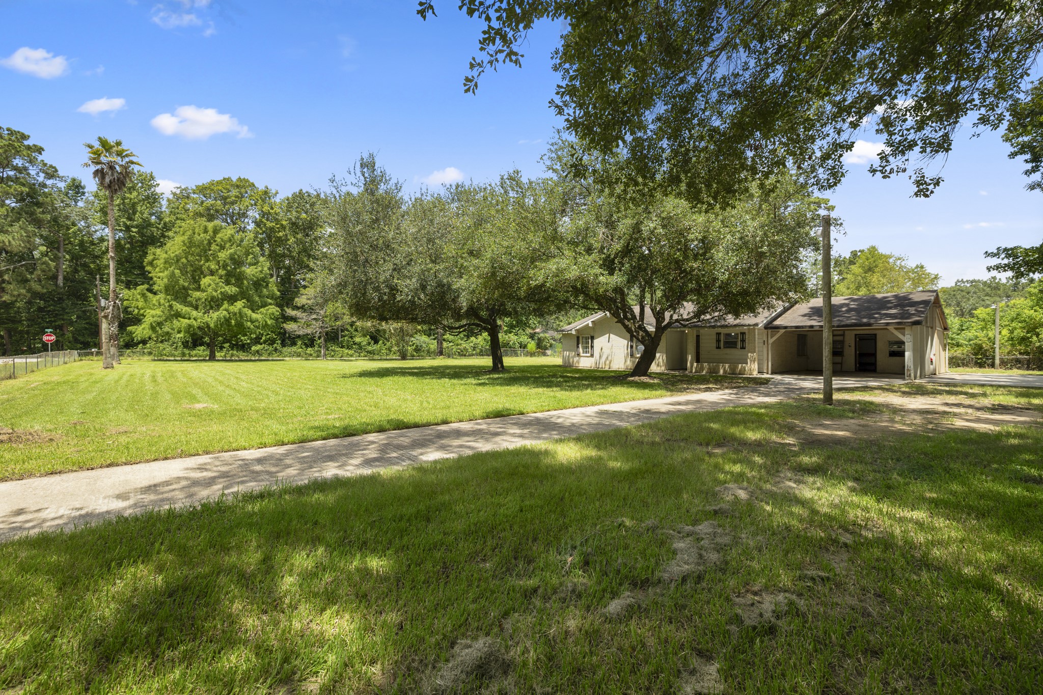 140 Friar Tuck Road Shepherd, TX 77371 - Photo 24 of 36 a house view with a outdoor space