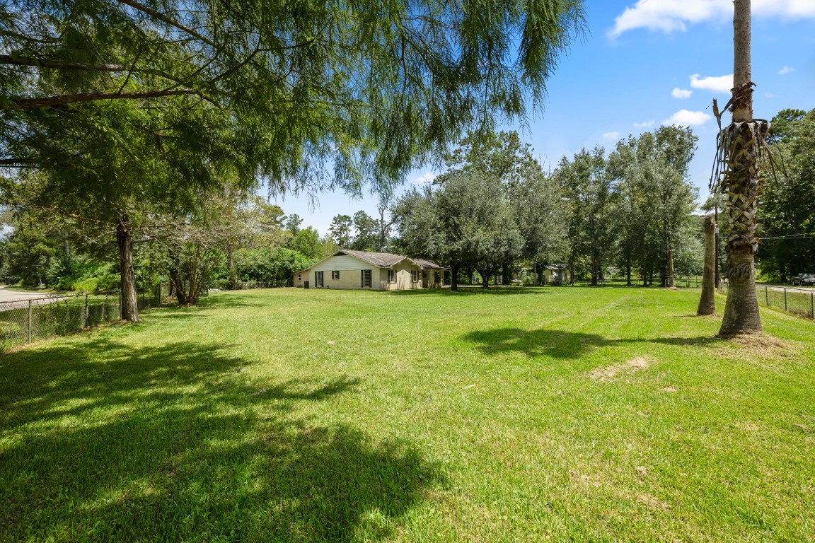 140 Friar Tuck Road Shepherd, TX 77371 - Photo 25 of 36 a view of green field with trees