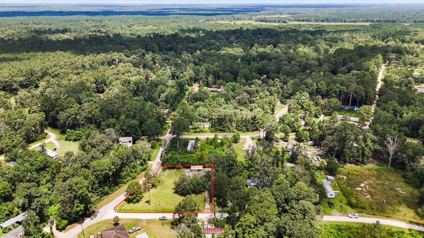 140 Friar Tuck Road Shepherd, TX 77371 - Photo 36 of 36 a view of a lake with a city