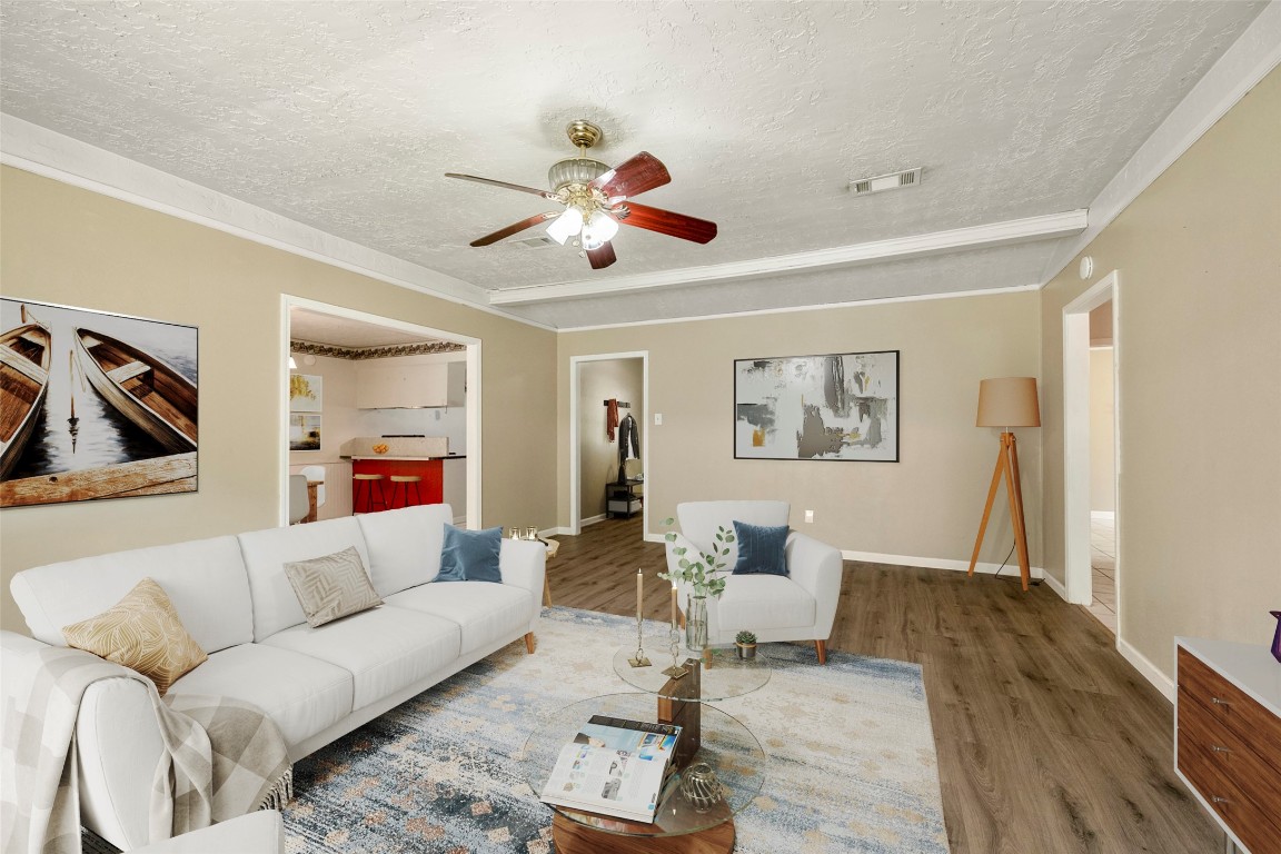 140 Friar Tuck Road Shepherd, TX 77371 - Photo 6 of 36 a living room with furniture and a wooden floor
