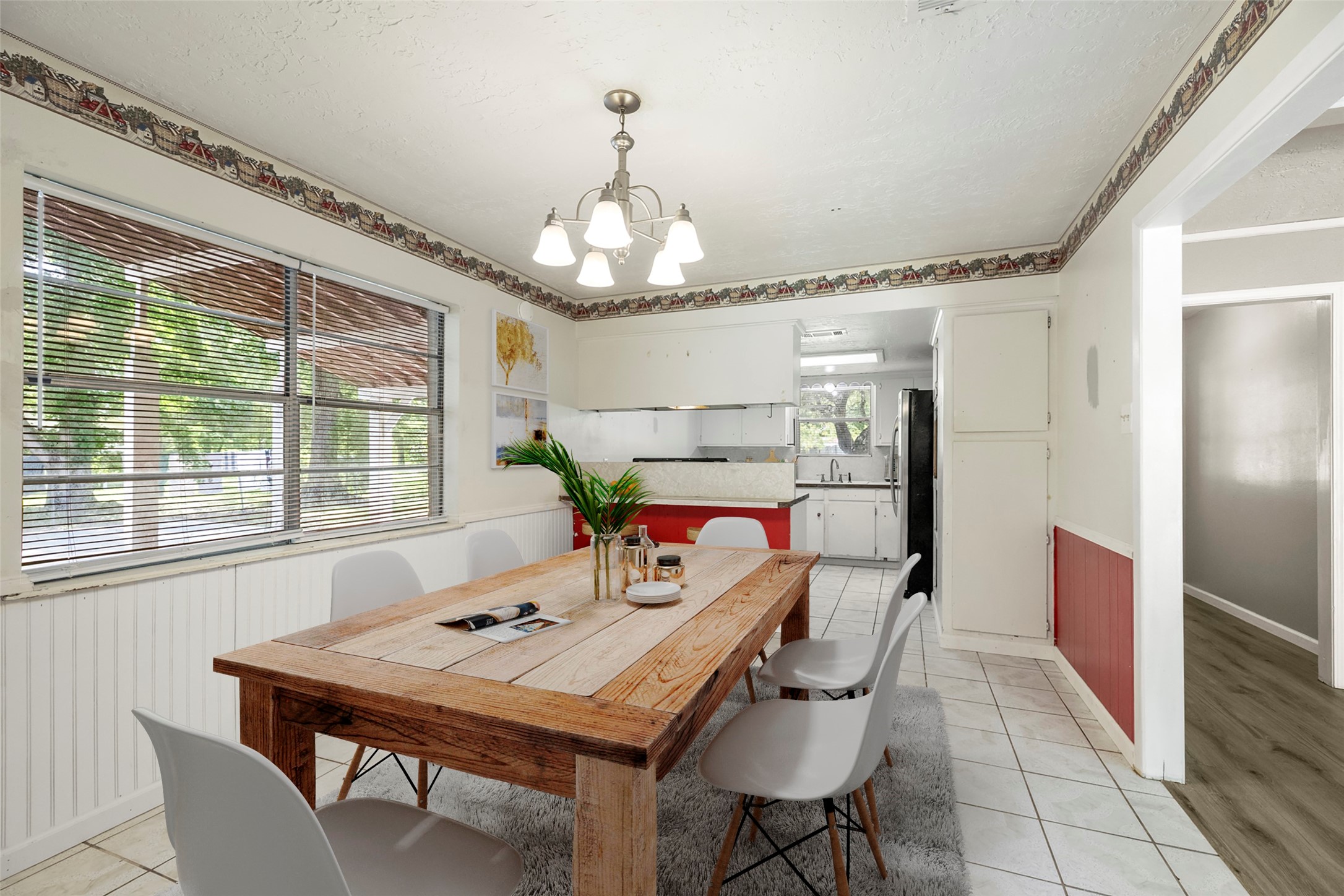 140 Friar Tuck Road Shepherd, TX 77371 - Photo 8 of 36 a view of a dining room with furniture window and wooden floor