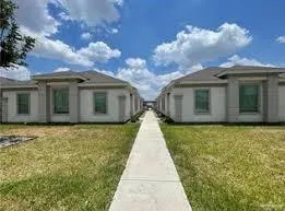 a view of a house with a garden