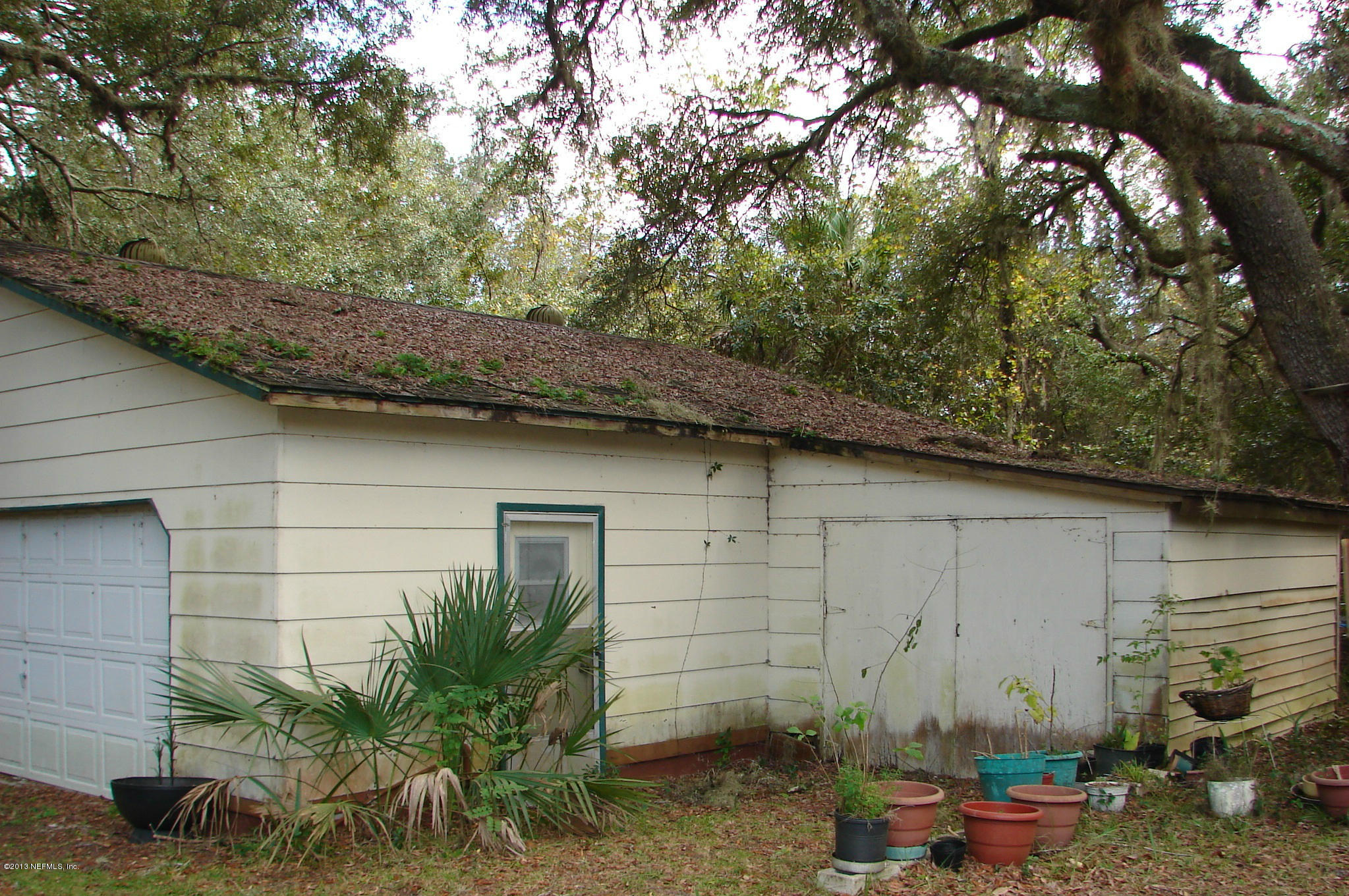 103 Heinz Road Hawthorne, FL 32640 - Photo 34 of 48 garage with workshop