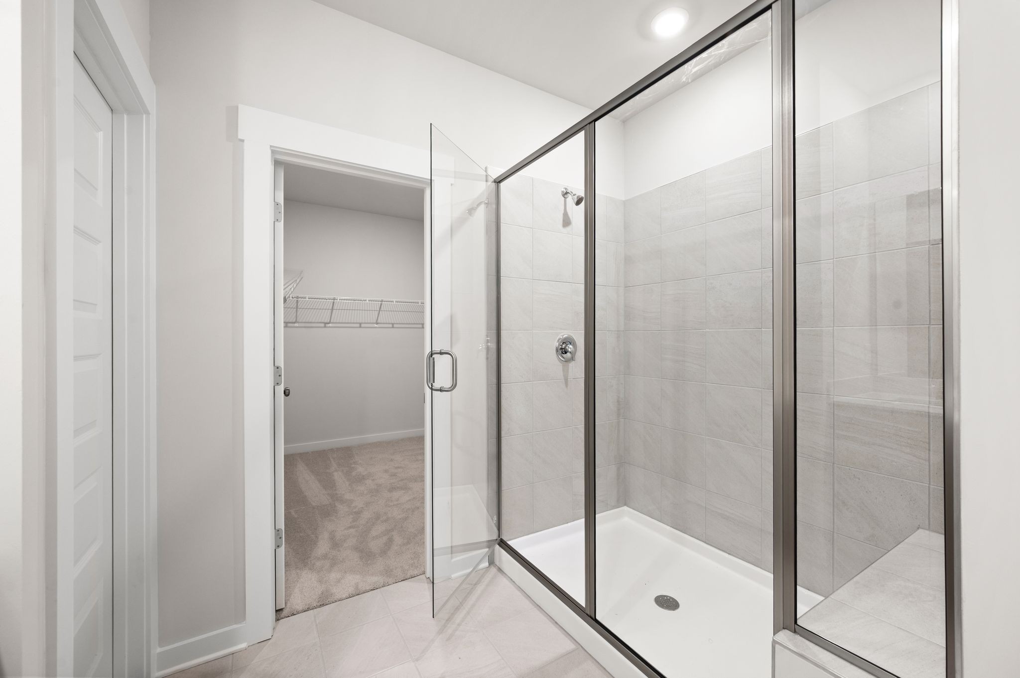 1019 Curtis Spring Lane Lewisburg, TN 37091 - Photo 15 of 23 a bathroom with a glass shower door