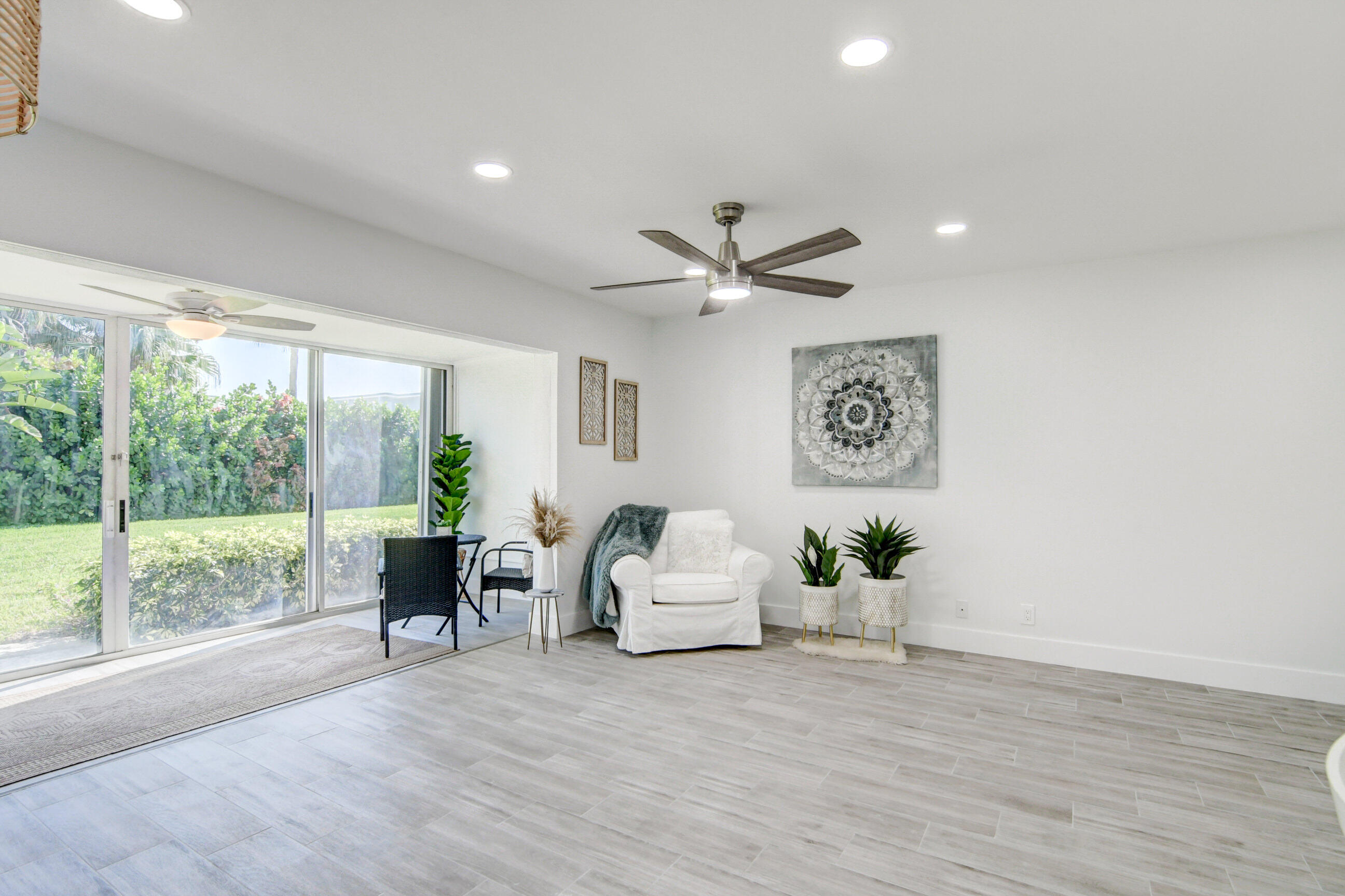 5720 Old Ocean Boulevard, Unit 4W Ocean Ridge, FL 33435 - Photo 14 of 46 a living room with furniture and window