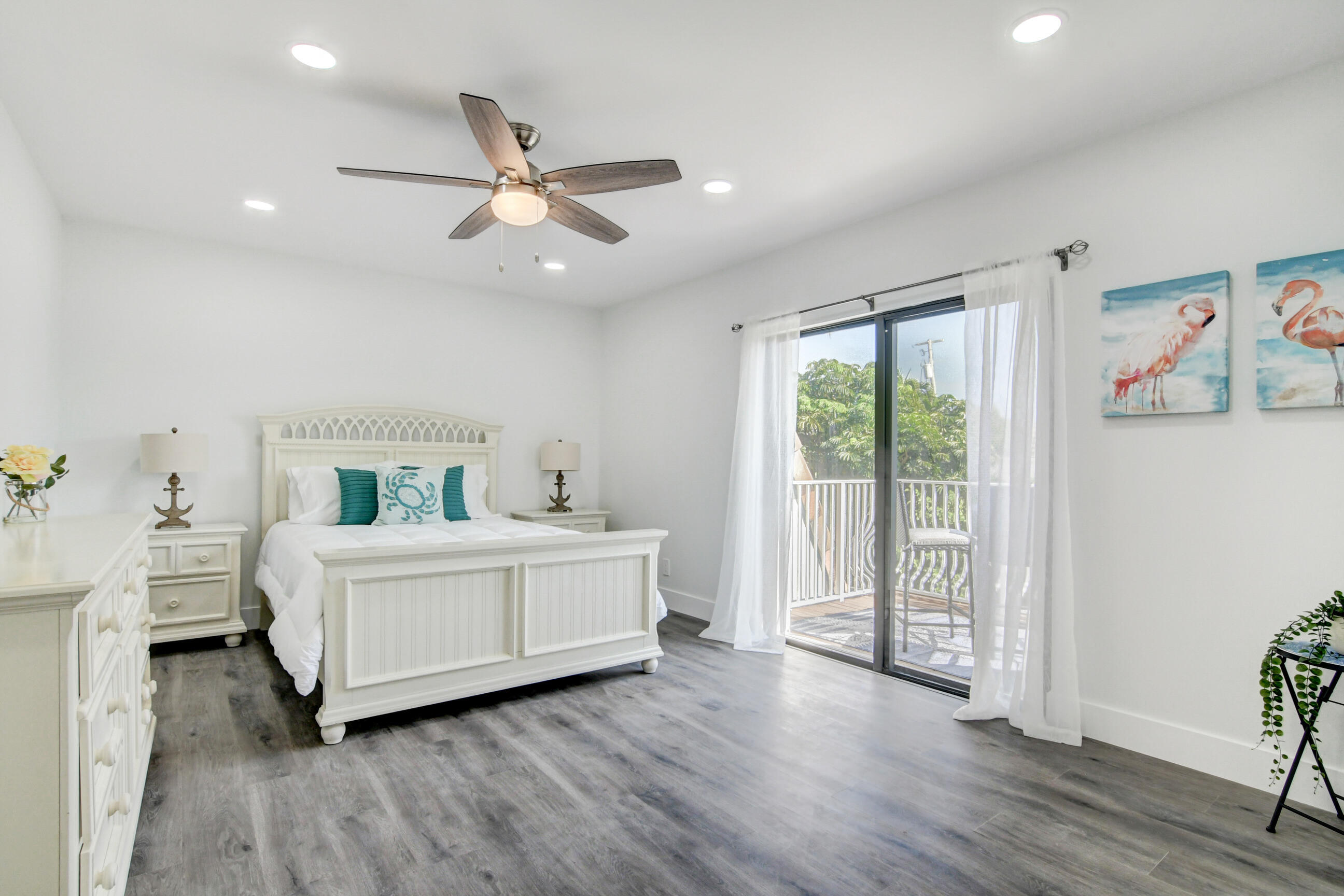 5720 Old Ocean Boulevard, Unit 4W Ocean Ridge, FL 33435 - Photo 27 of 46 a living room with a bed furniture and a window