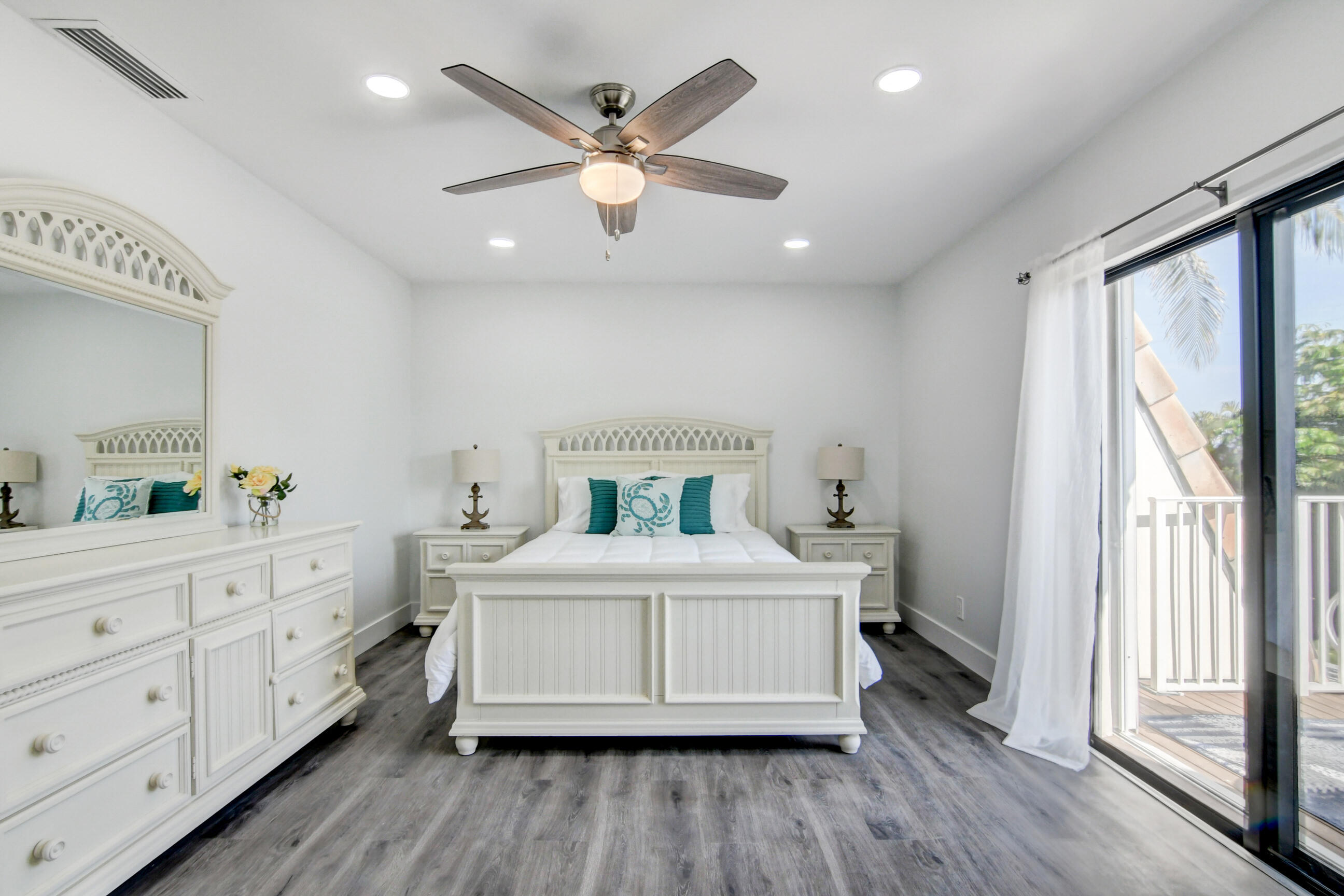 5720 Old Ocean Boulevard, Unit 4W Ocean Ridge, FL 33435 - Photo 30 of 46 a room with a bed and a large window